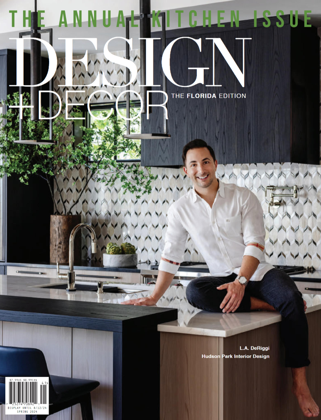 Hudson Park Interior Design owner and principal designer sitting on kitchen counter for contemporary kitchen remodel featured on the cover of Design + Decor Magazine the Florida Edition