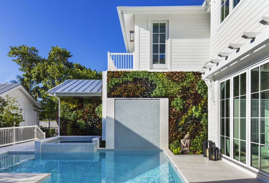 Lanai and pool area designed by Southwest Florida interior design firm Hudson Park Interior Design.